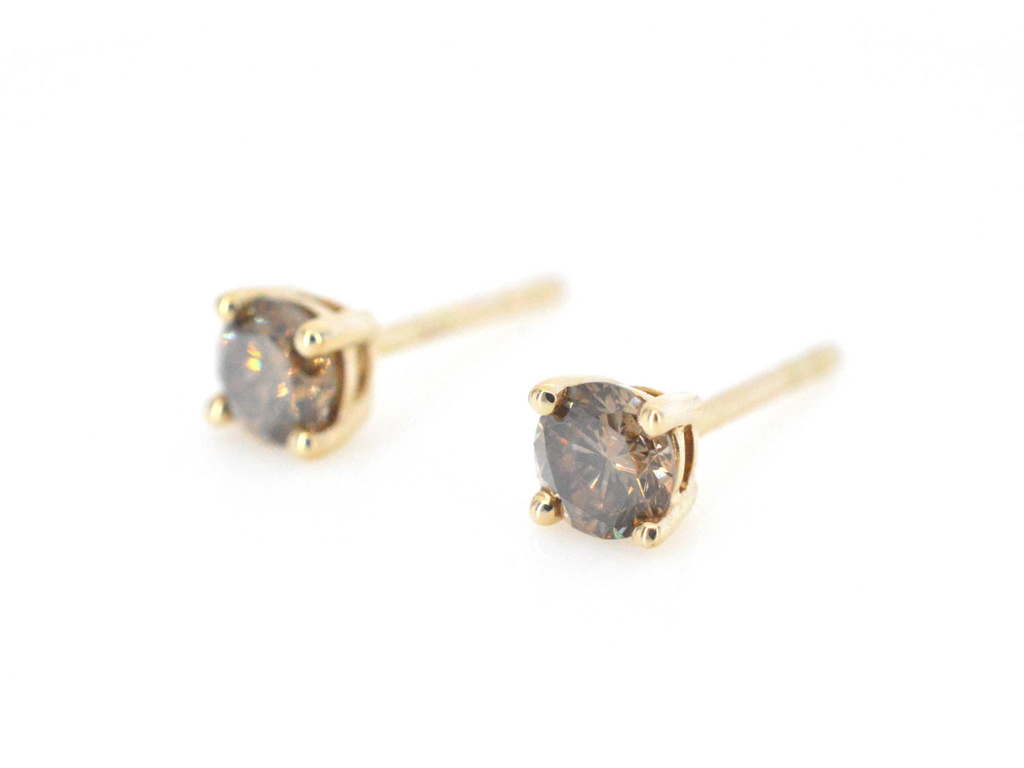 Gouden solitair oorbellen met champagne diamanten