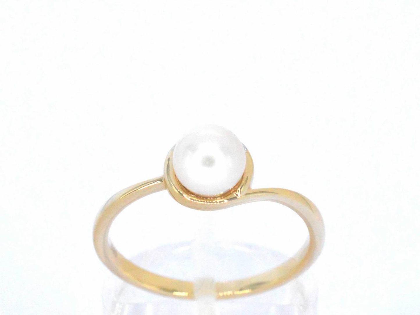 Gouden ring met diamanten en een parel