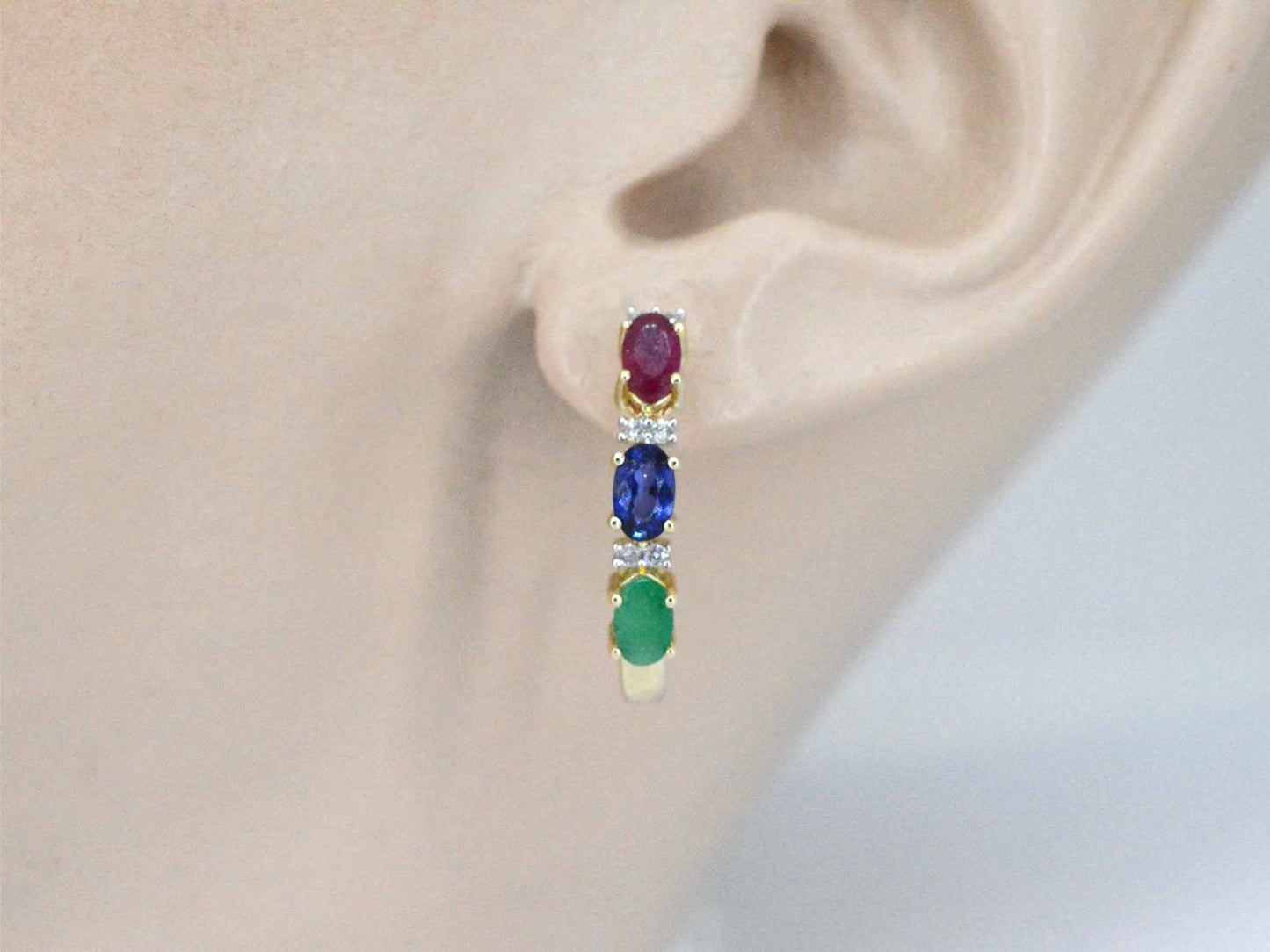 Gouden oorbellen met multicolour edelstenen en diamant