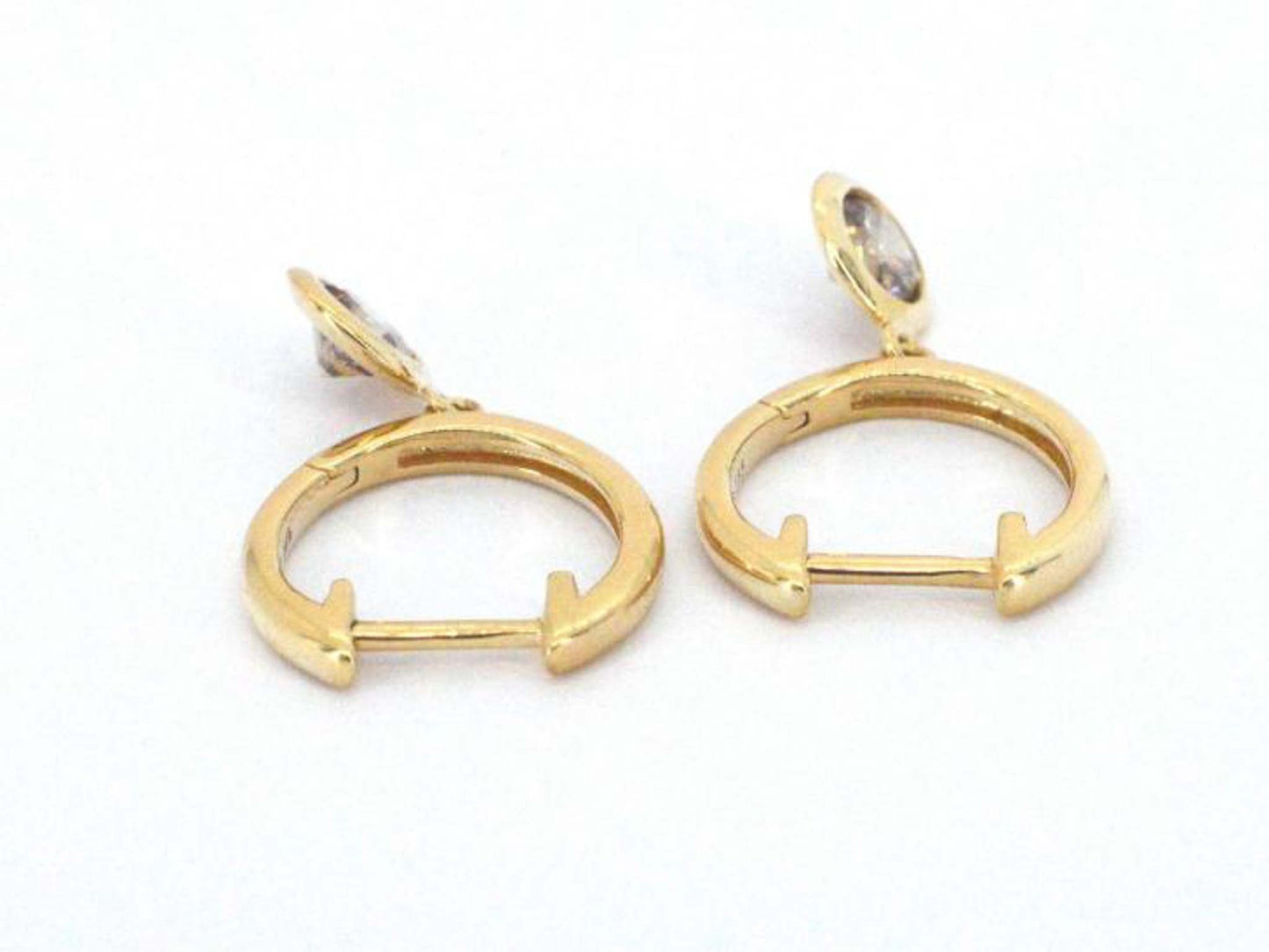 Gouden oorbellen met natuurlijke diamanten