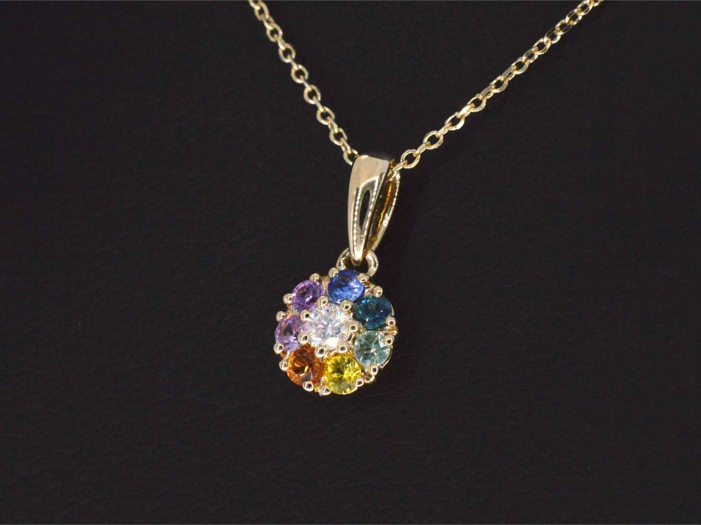 Gouden hanger met diamanten en multicolour saffieren