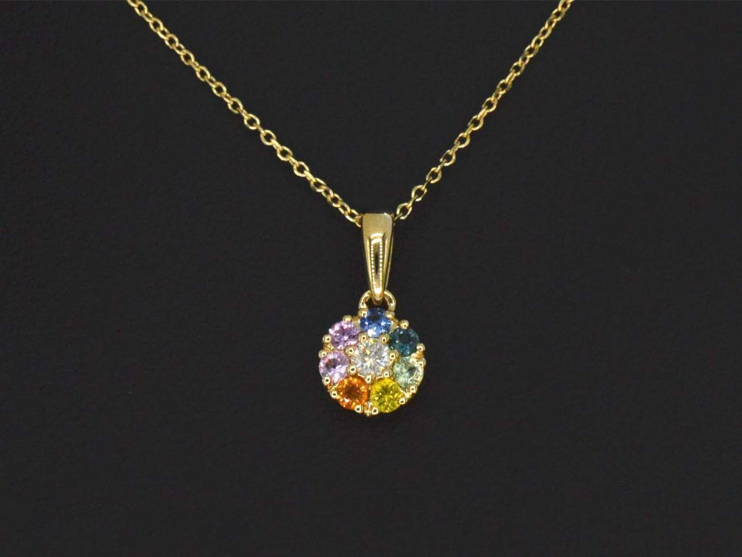 Gouden hanger met diamanten en multicolour saffieren