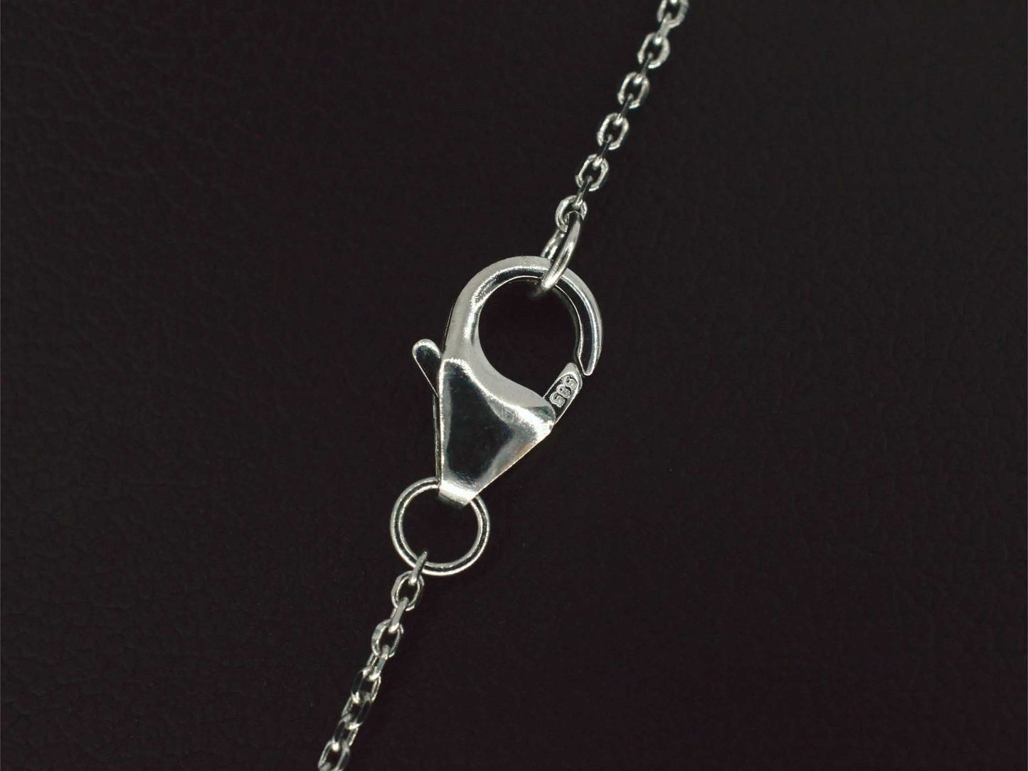 Witgouden hanger met diamanten en saffieren