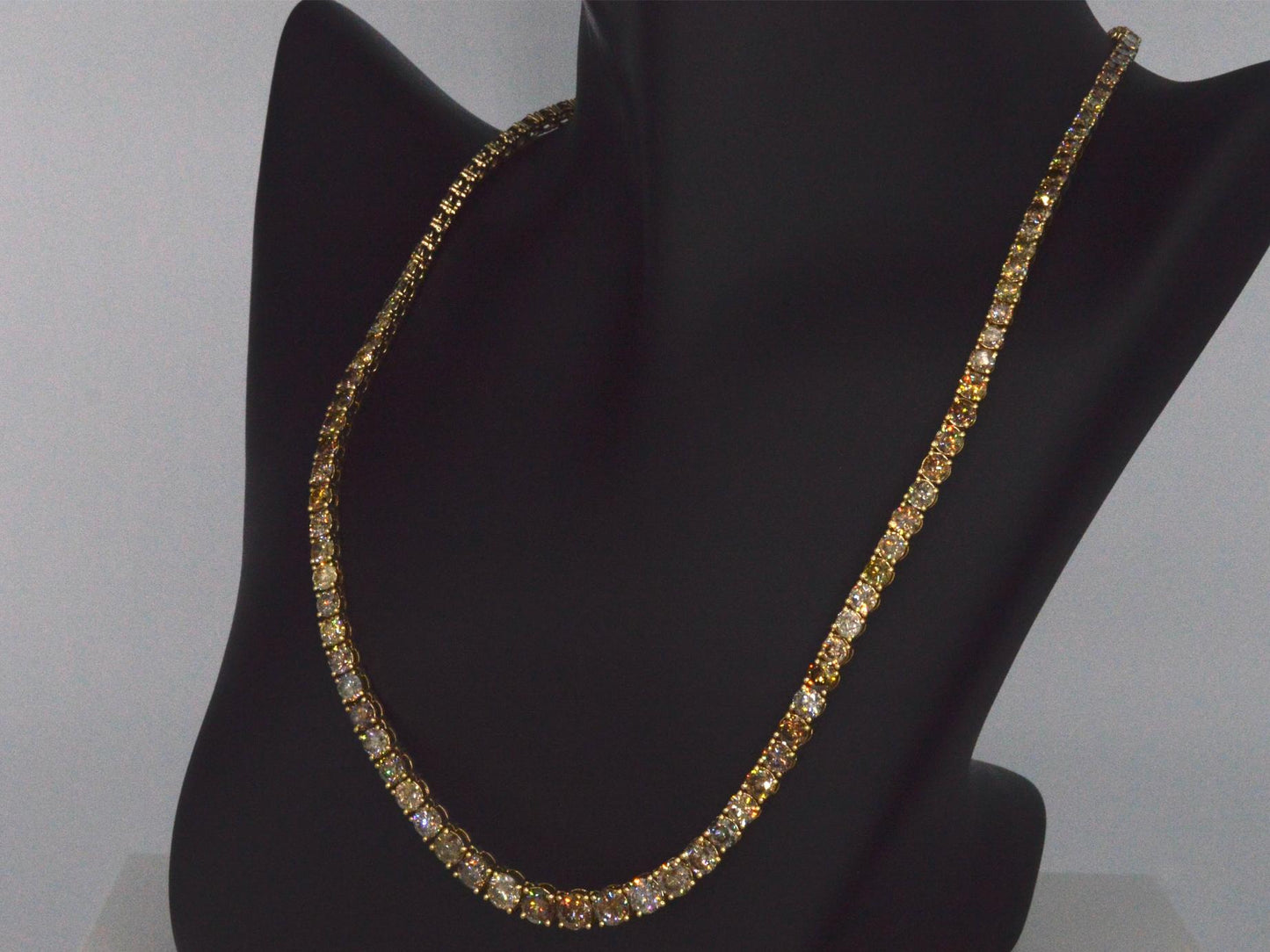Gouden tennis collier met champagne en cognac diamanten