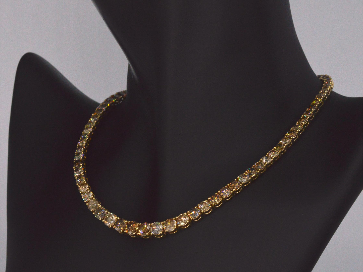 Gouden tennis collier met champagne en cognac diamanten