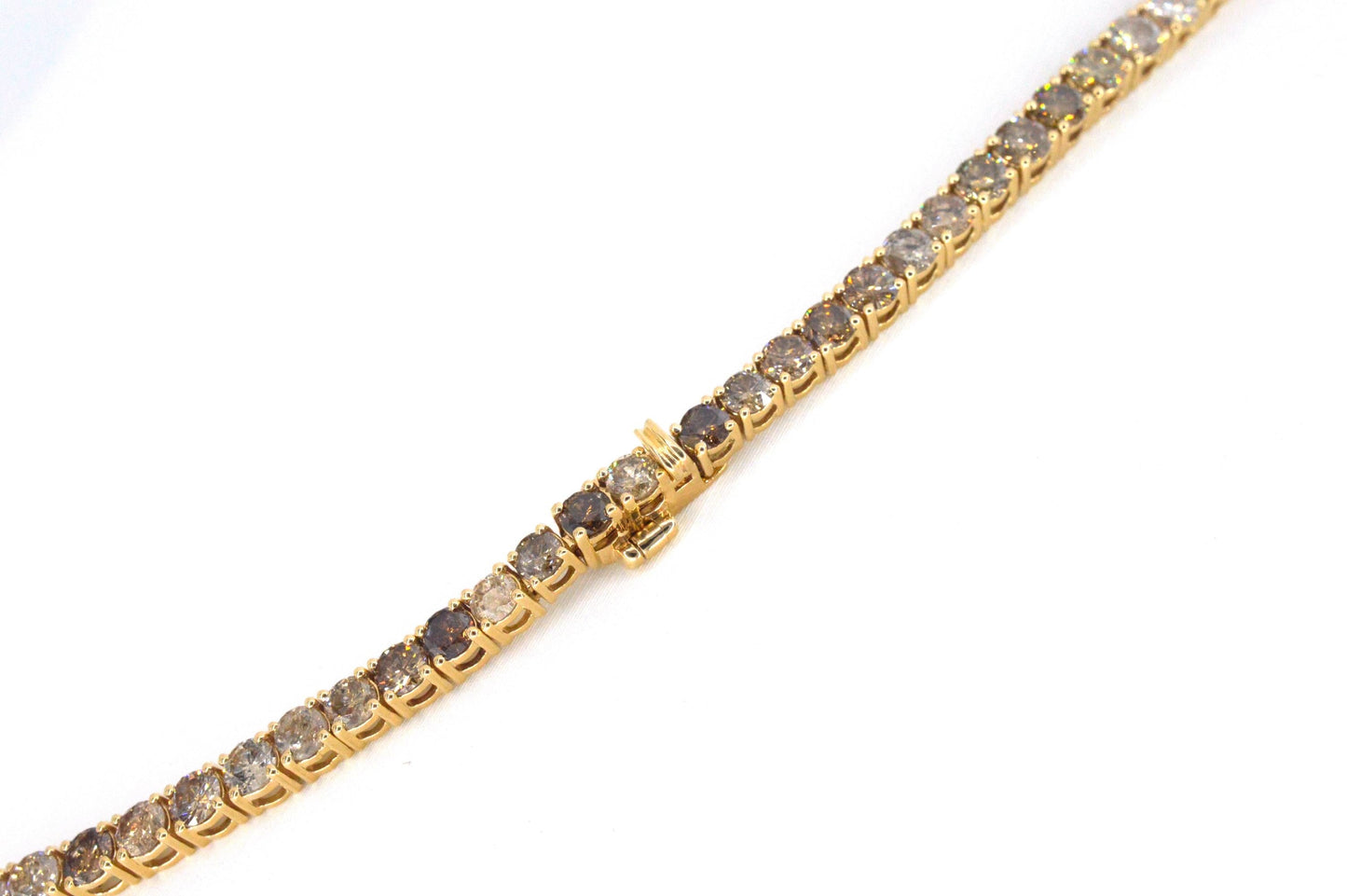 Gouden tennis collier met champagne en cognac diamanten