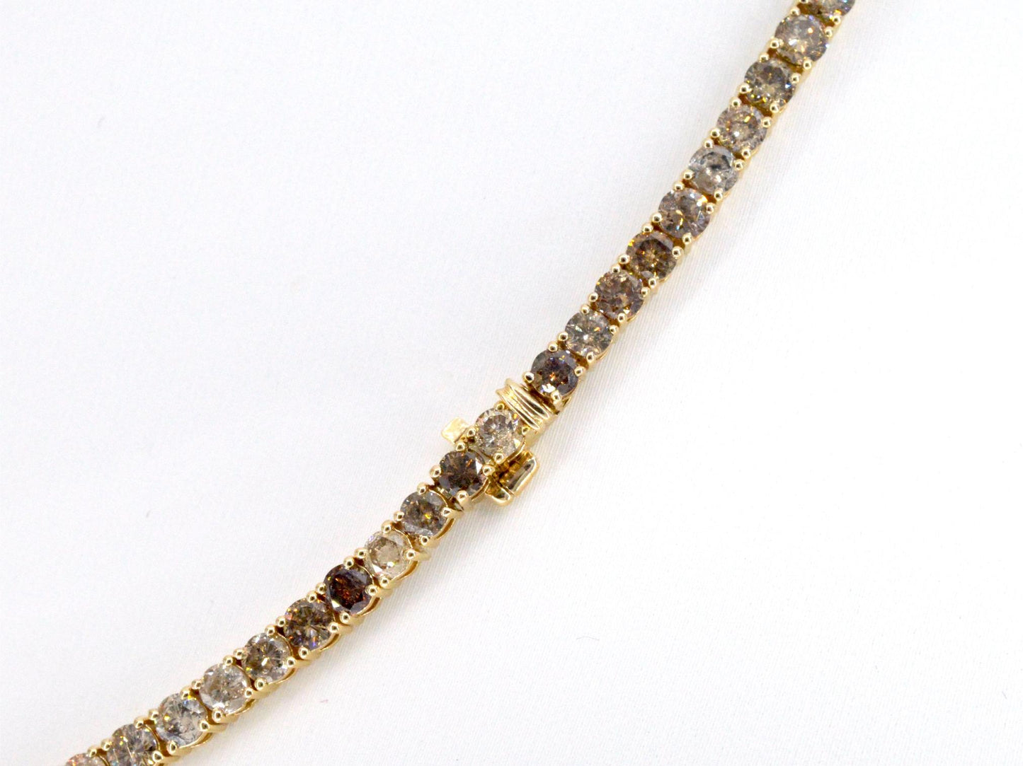 Gouden tennis collier met champagne en cognac diamanten