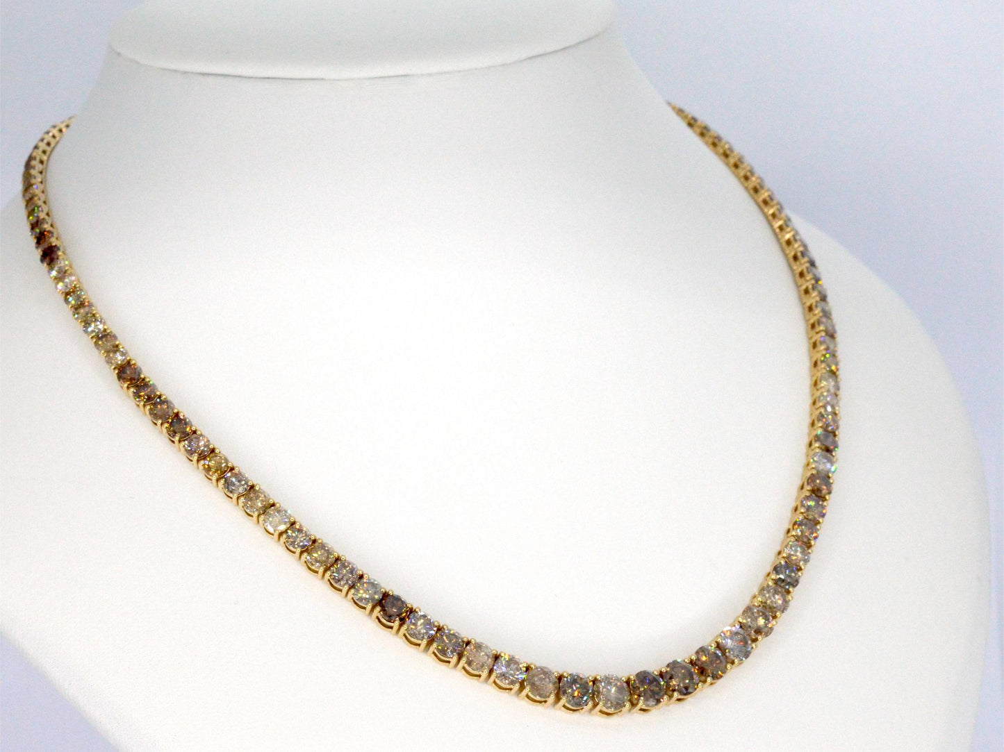 Gouden tennis collier met champagne en cognac diamanten