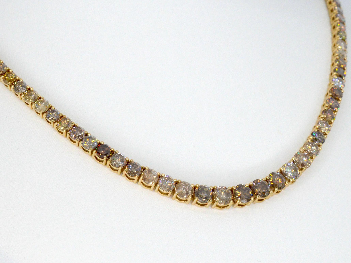 Gouden tennis collier met champagne en cognac diamanten