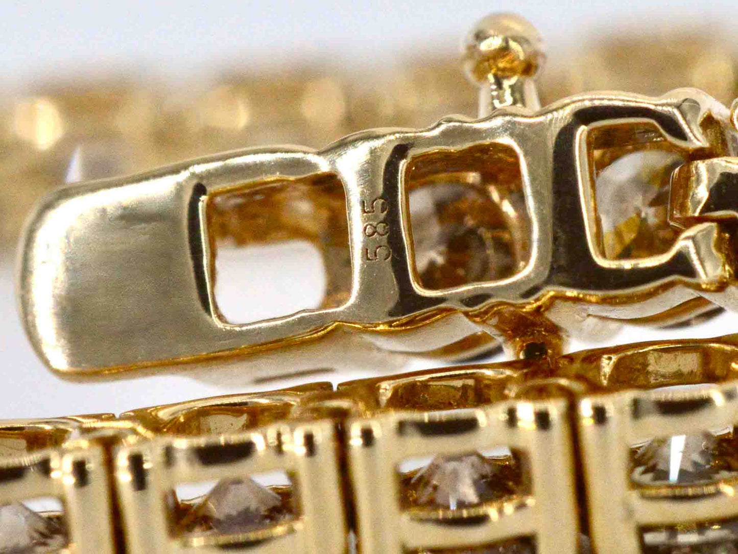 Geelgouden exclusieve tennis collier met champagne en cognac diamanten