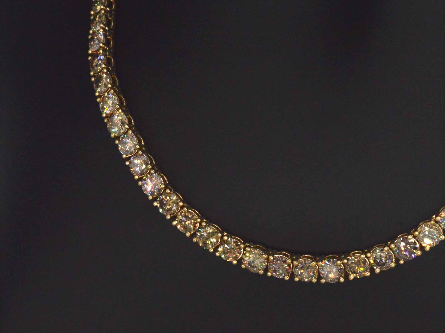 Geelgouden exclusieve tennis collier met champagne en cognac diamanten