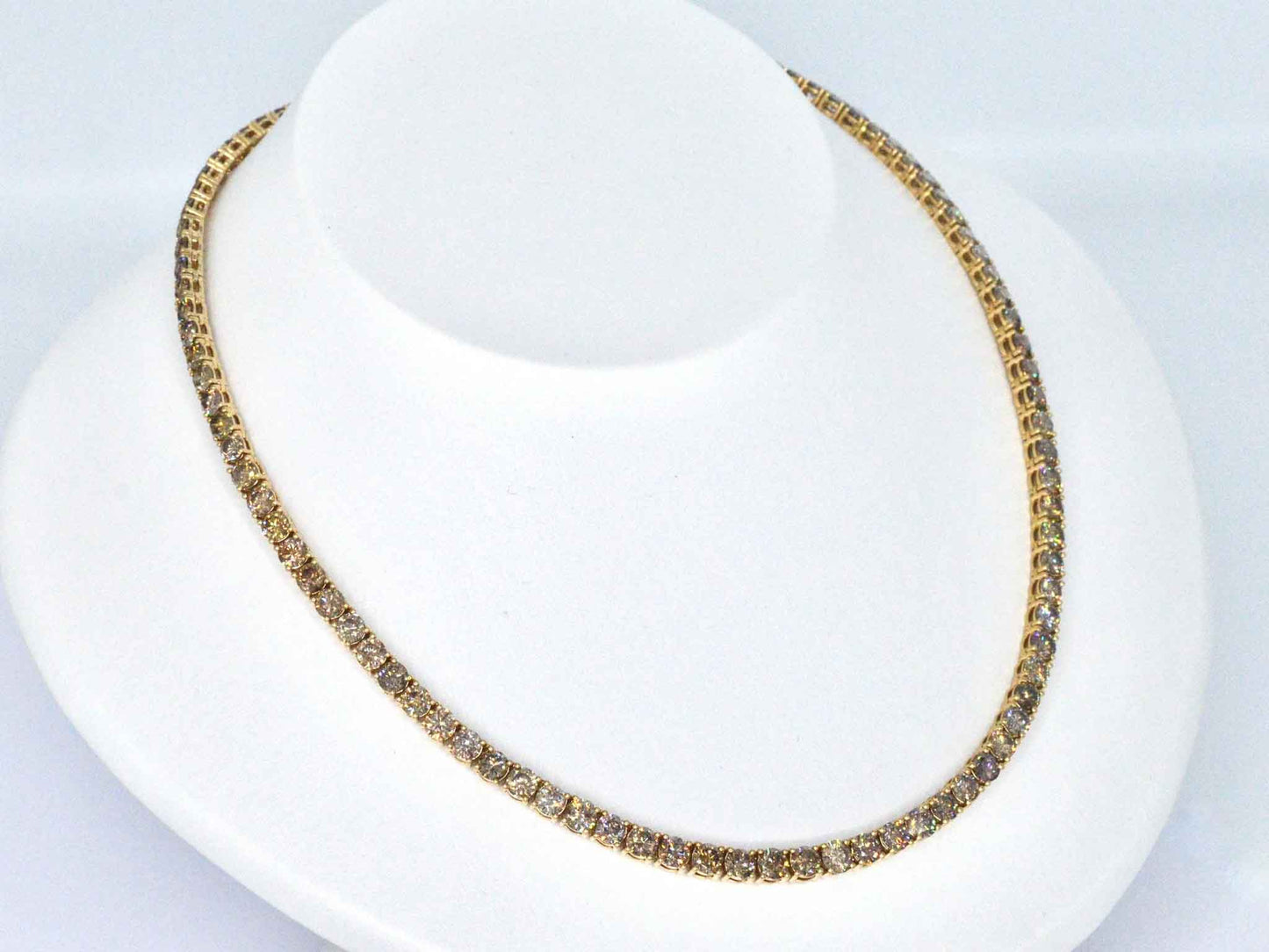 Geelgouden exclusieve tennis collier met champagne en cognac diamanten