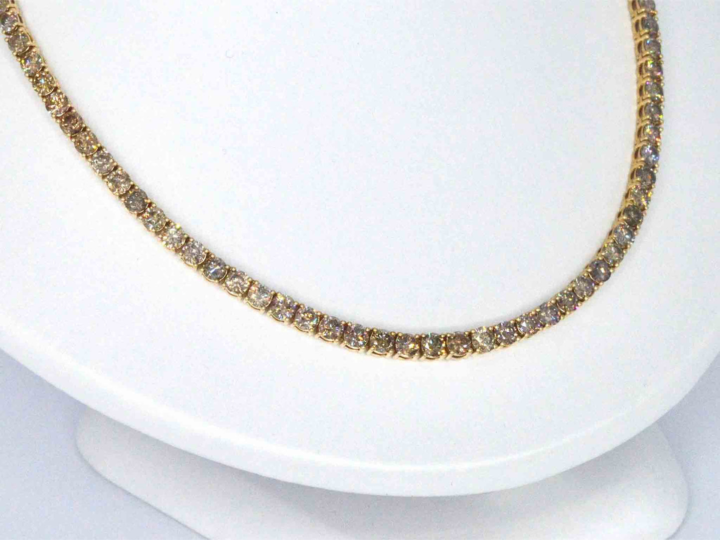 Geelgouden exclusieve tennis collier met champagne en cognac diamanten