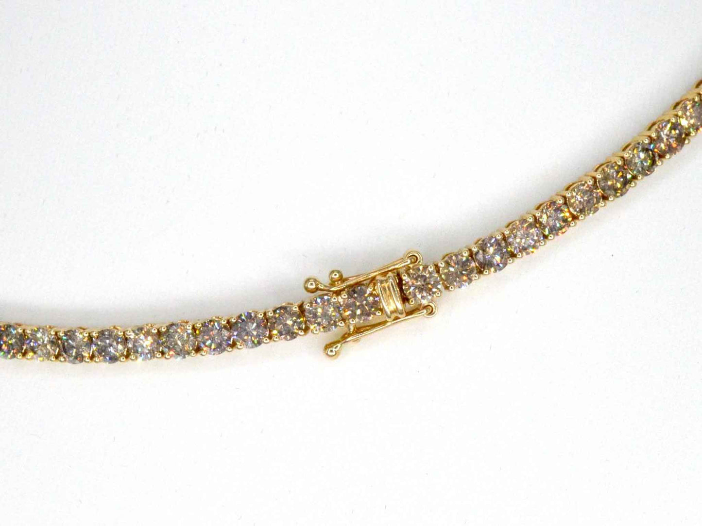 Geelgouden exclusieve tennis collier met champagne en cognac diamanten