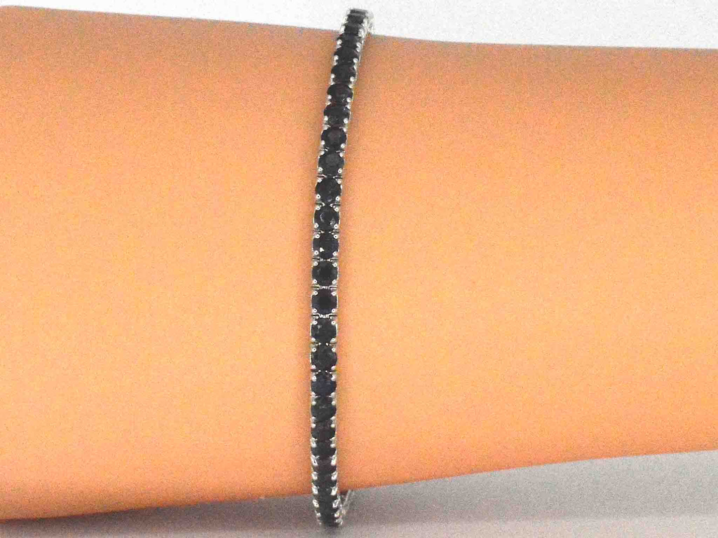 Gouden tennisarmband met 7.00 carat aan blauwe saffieren
