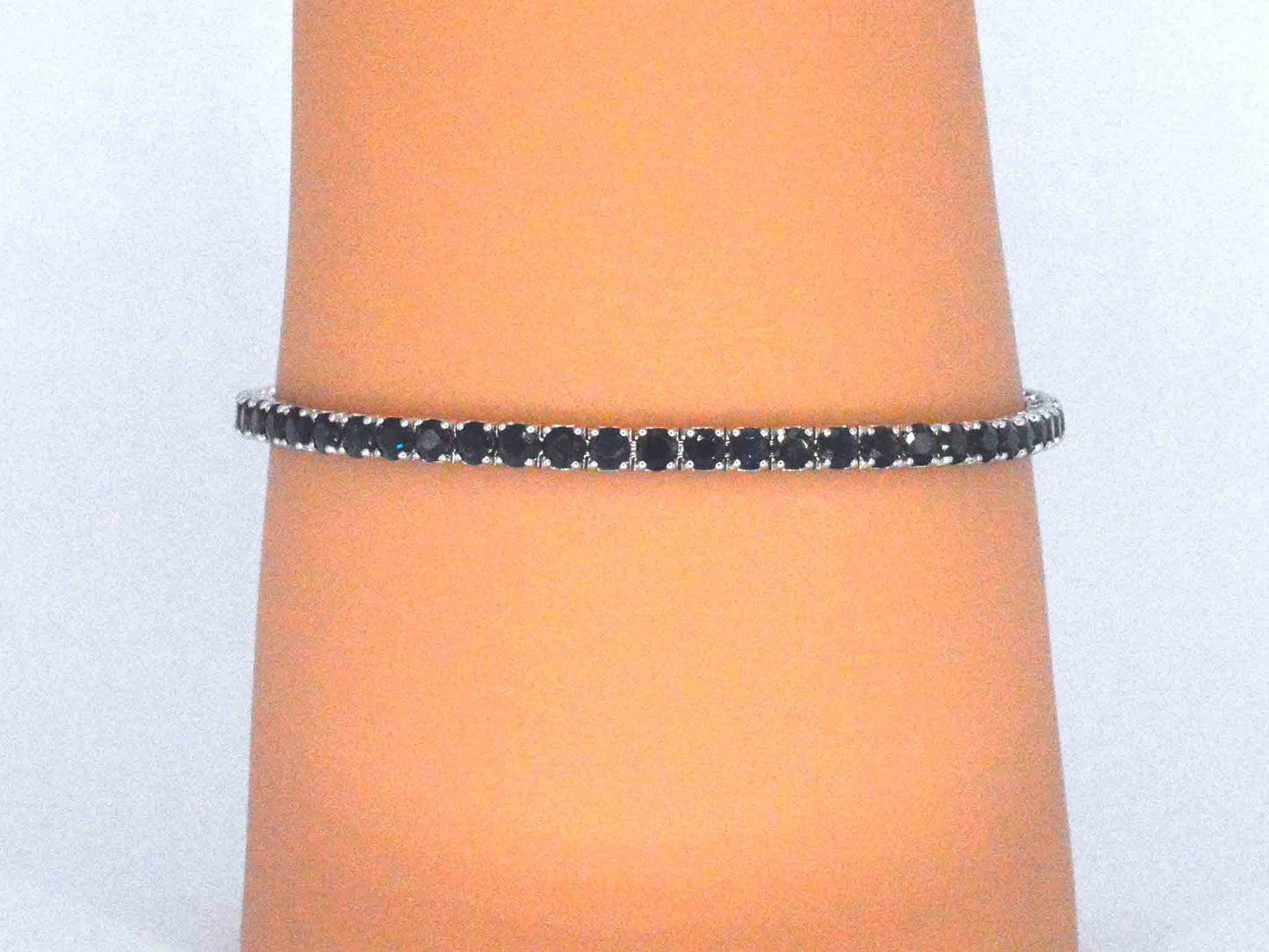 Gouden tennisarmband met 7.00 carat aan blauwe saffieren