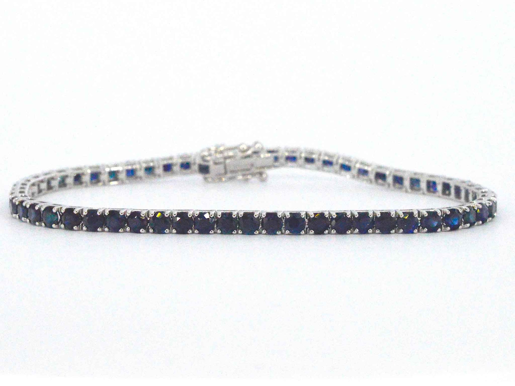 Gouden tennisarmband met 7.00 carat aan blauwe saffieren