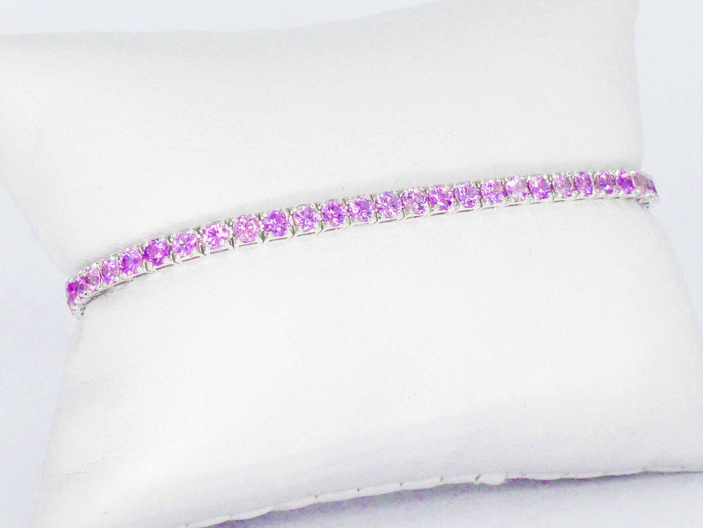 Gouden tennisarmband met 6.00 carat aan roze saffieren