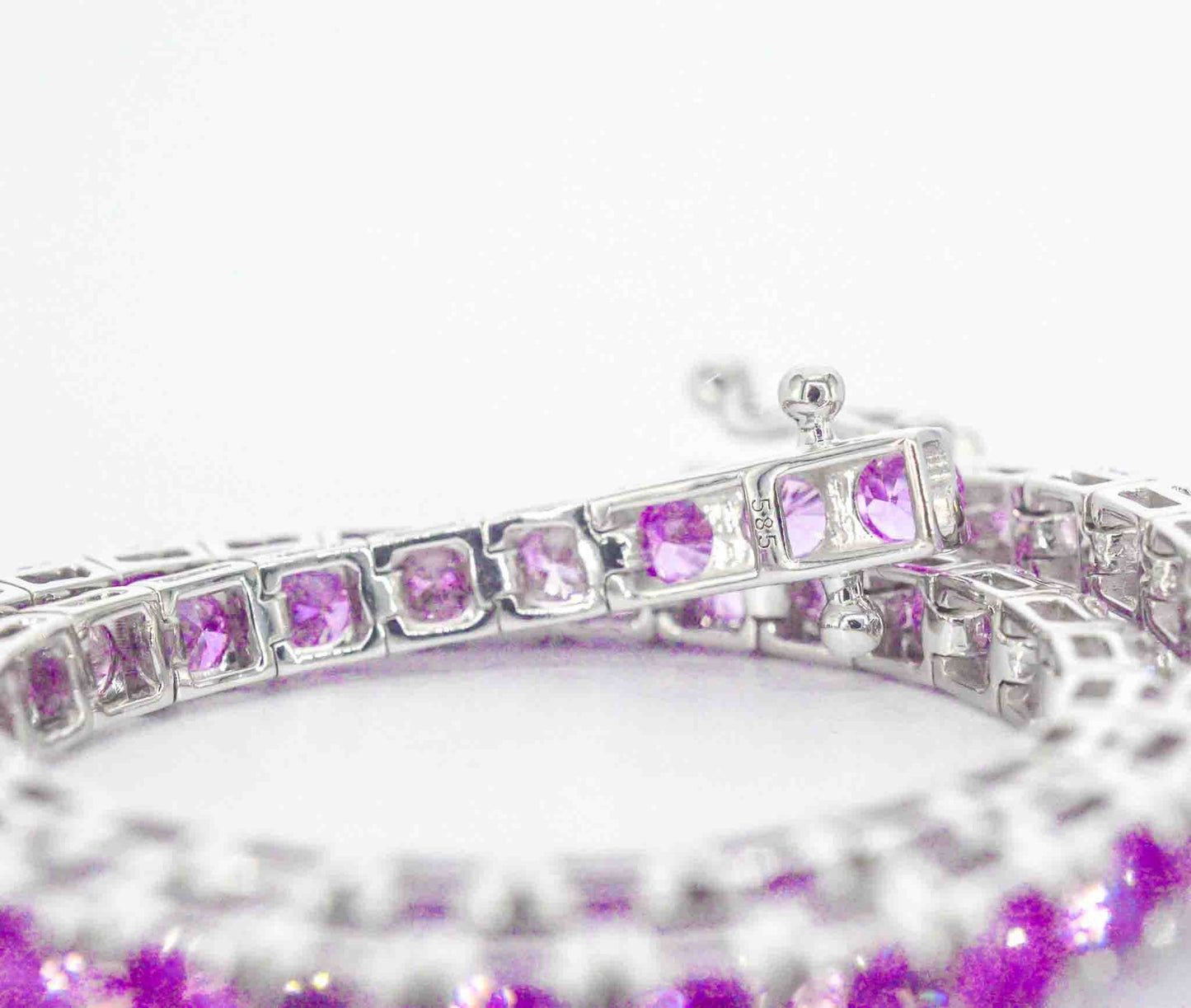 Gouden tennisarmband met 6.00 carat aan roze saffieren