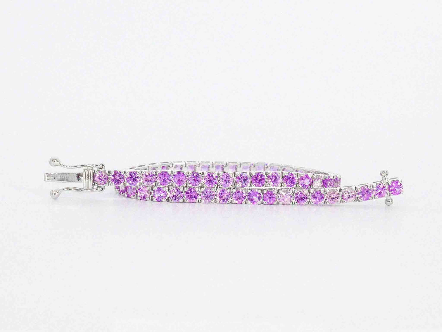 Gouden tennisarmband met 6.00 carat aan roze saffieren