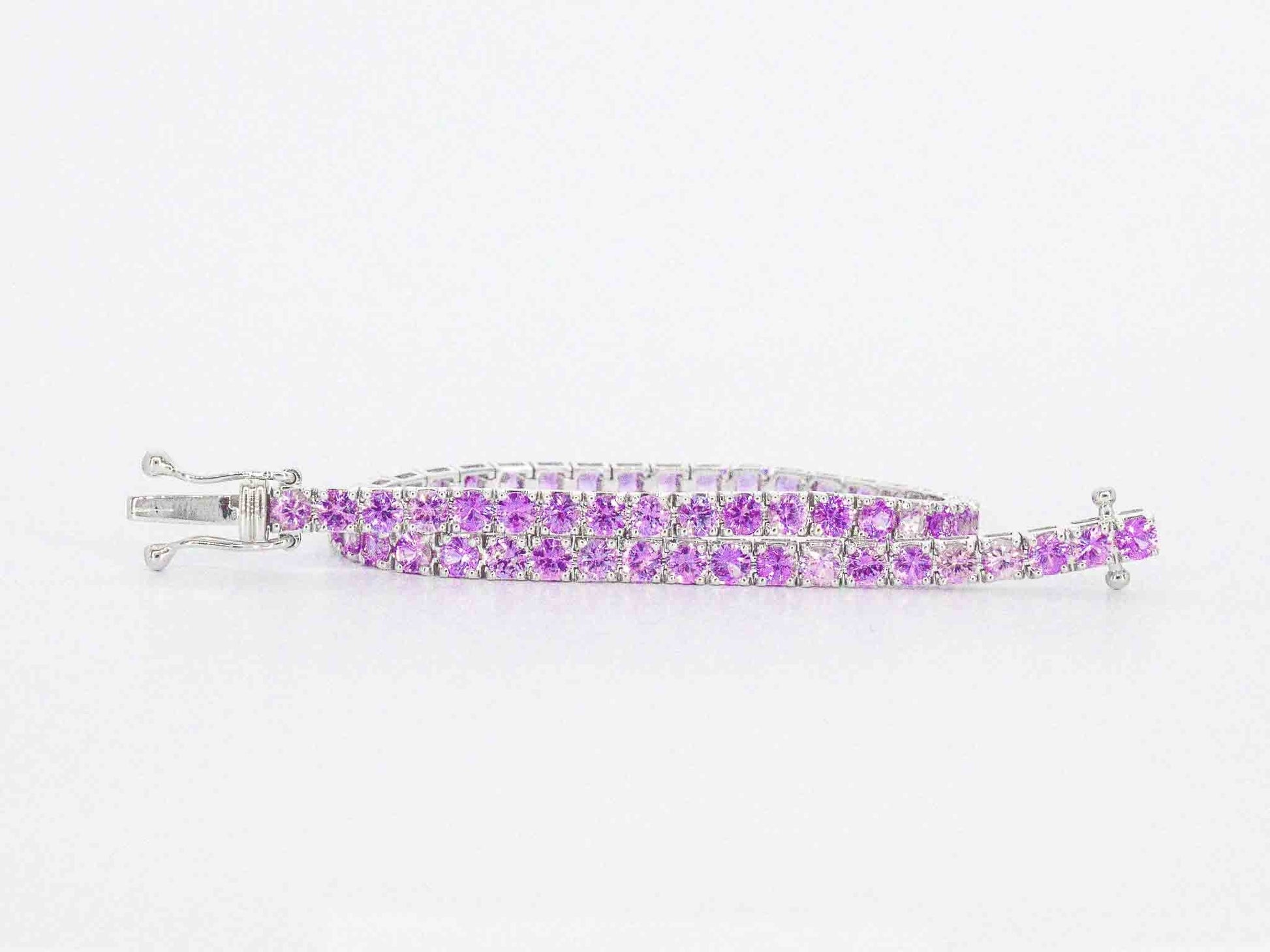 Gouden tennisarmband met 6.00 carat aan roze saffieren