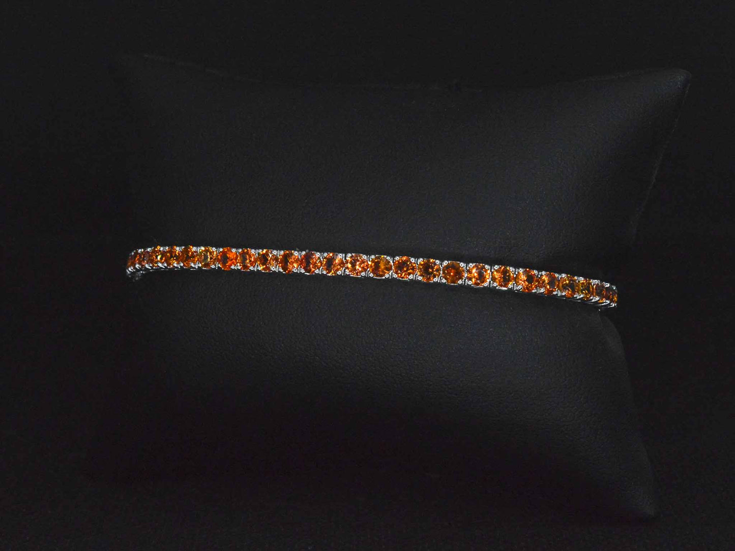 Gouden tennisarmband met 8.00 carat aan oranje saffieren