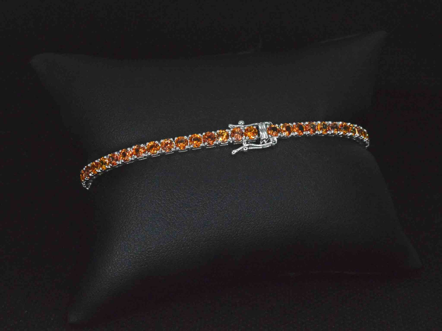 Gouden tennisarmband met 8.00 carat aan oranje saffieren