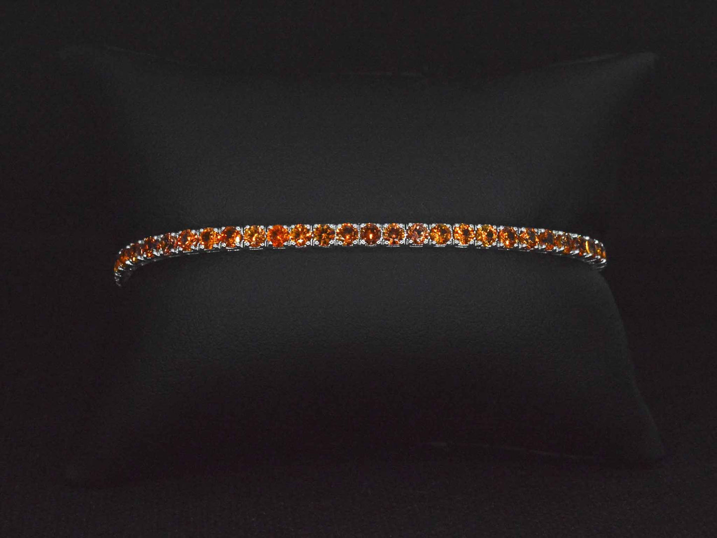 Gouden tennisarmband met 8.00 carat aan oranje saffieren