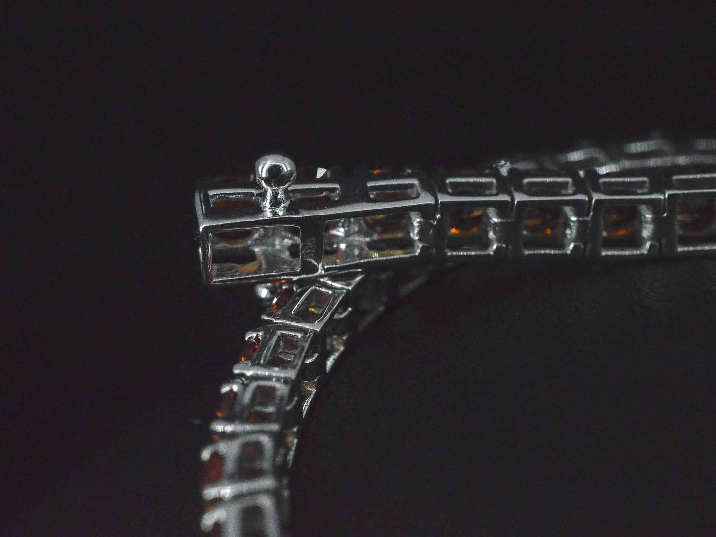 Gouden tennisarmband met 8.00 carat aan oranje saffieren