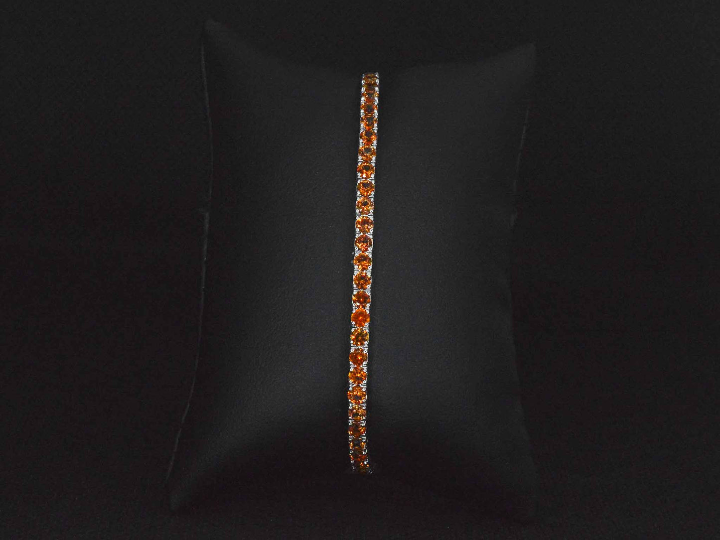 Gouden tennisarmband met 8.00 carat aan oranje saffieren