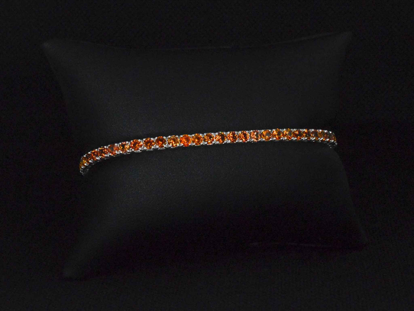 Gouden tennisarmband met 8.00 carat aan oranje saffieren