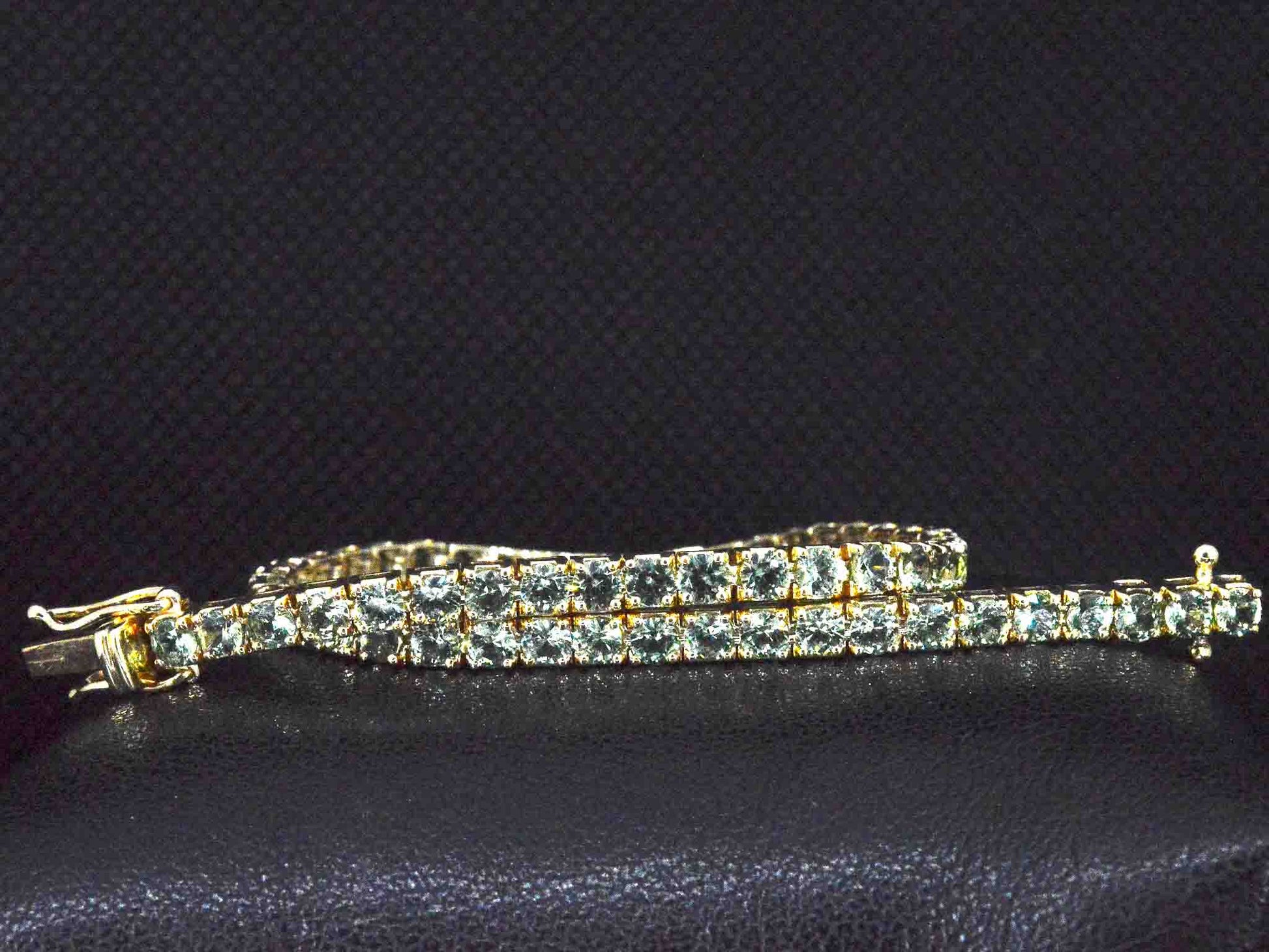 Gouden tennisarmband met 8.00 carat aan groene saffieren