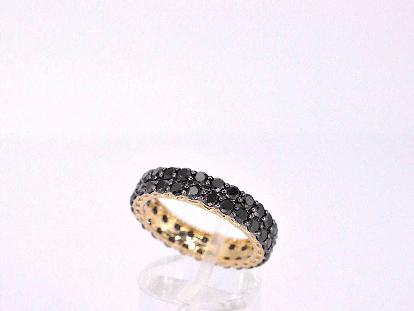 Gouden dubbele eternity ring met zwarte diamanten