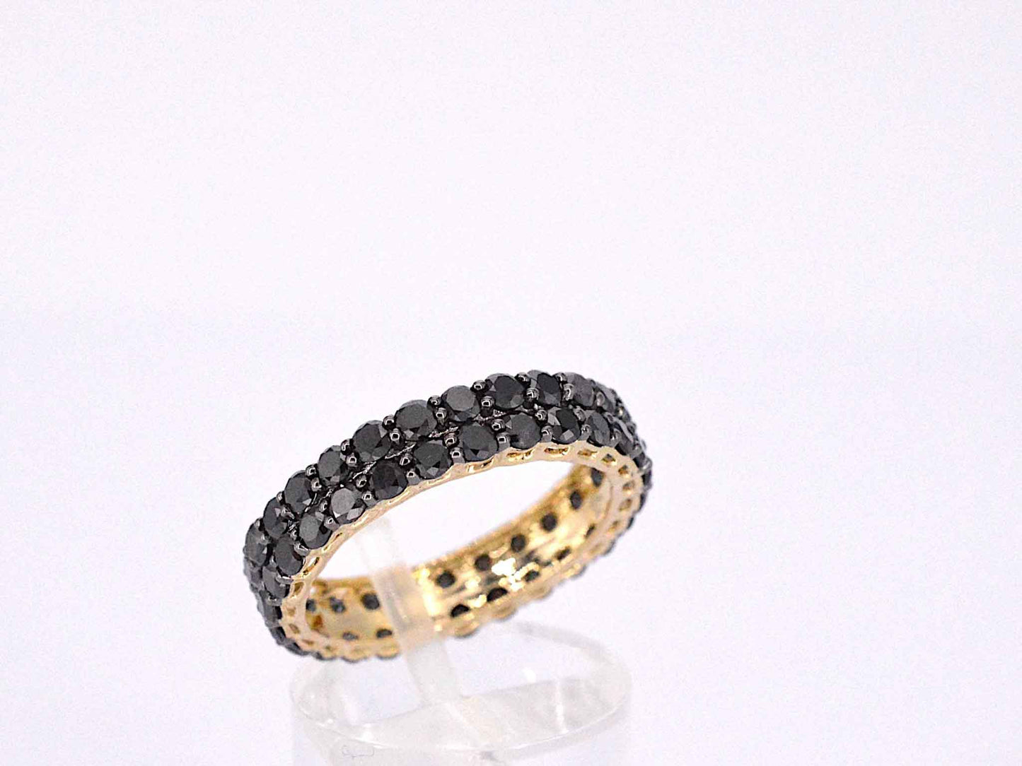 Gouden dubbele eternity ring met zwarte diamanten