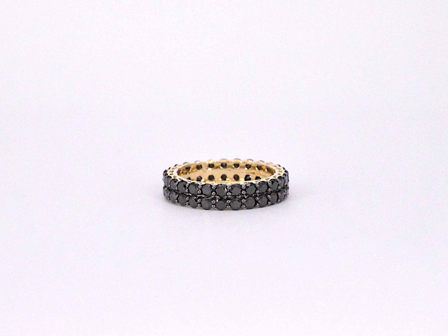 Gouden dubbele eternity ring met zwarte diamanten
