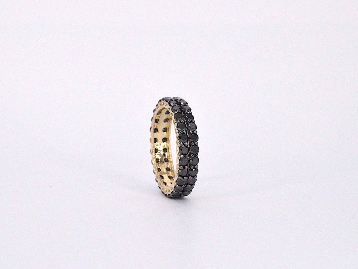 Gouden dubbele eternity ring met zwarte diamanten