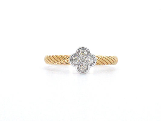 Gouden ring met een klavertje vier gezet met diamanten
