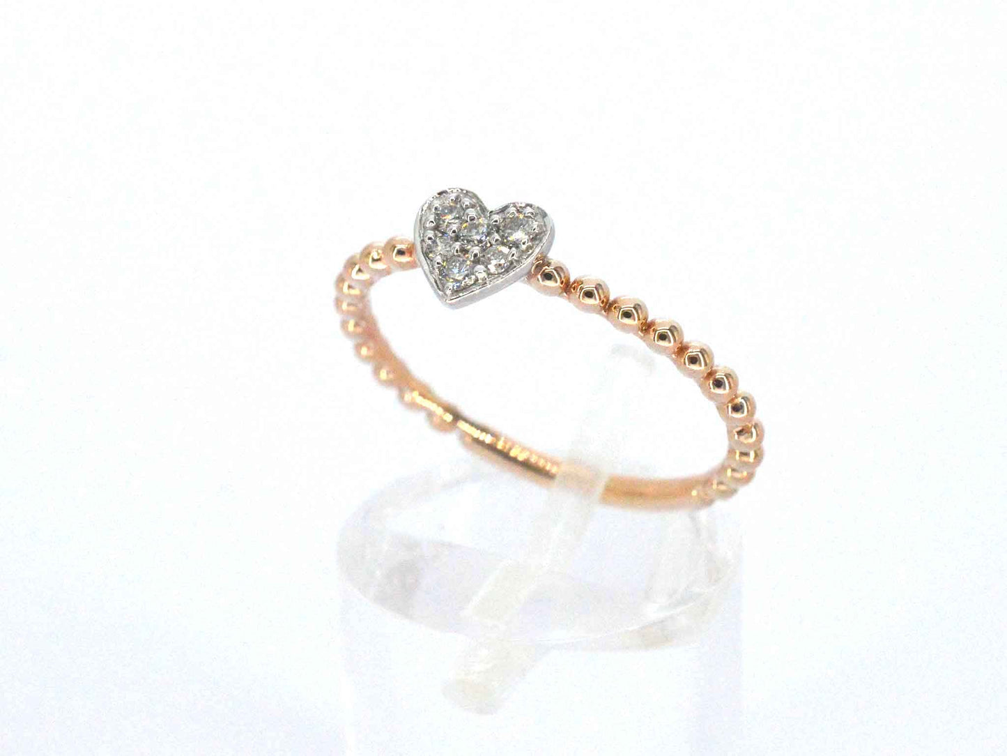 Rosegouden ring met een hartje vol gezet met diamanten