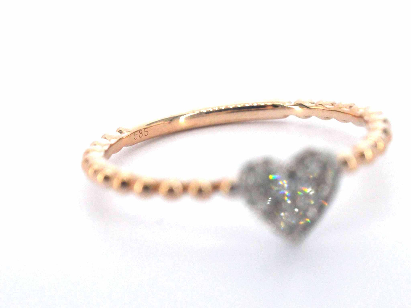 Rosegouden ring met een hartje vol gezet met diamanten