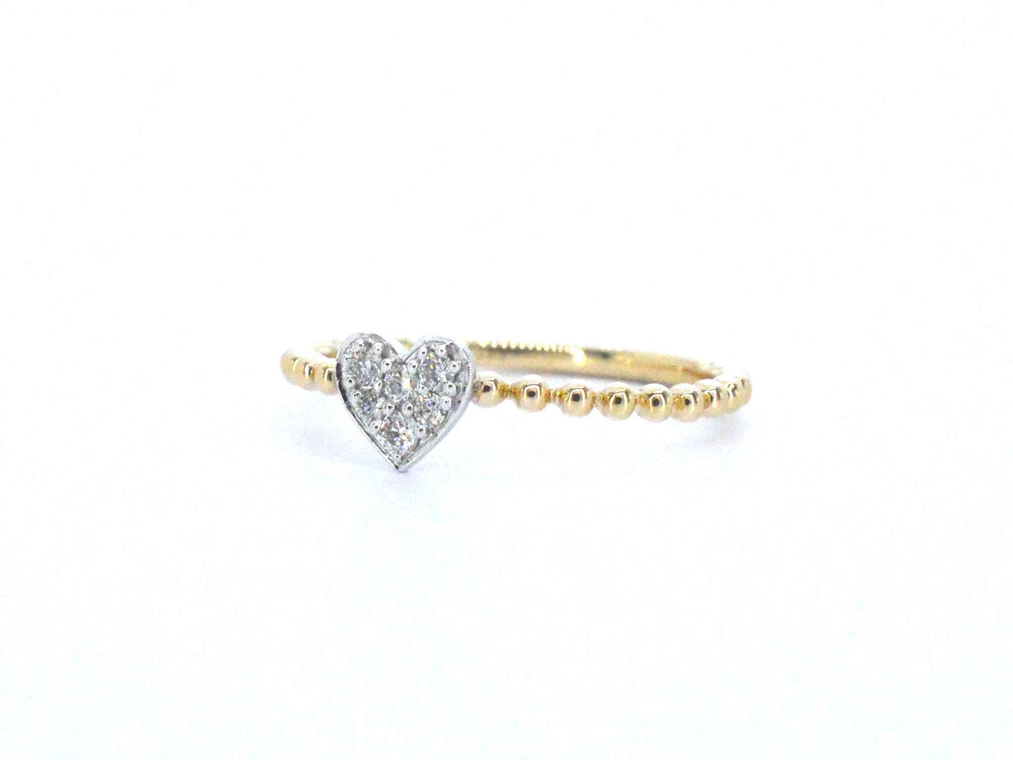 Gouden ring met een hartje vol gezet met diamanten