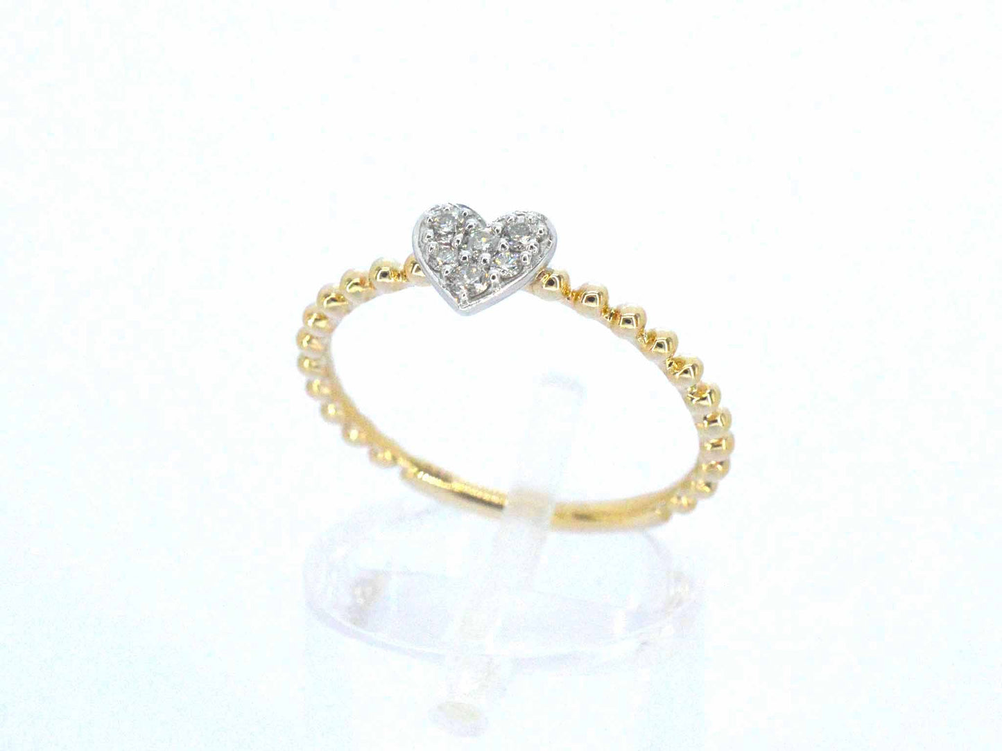 Gouden ring met een hartje vol gezet met diamanten