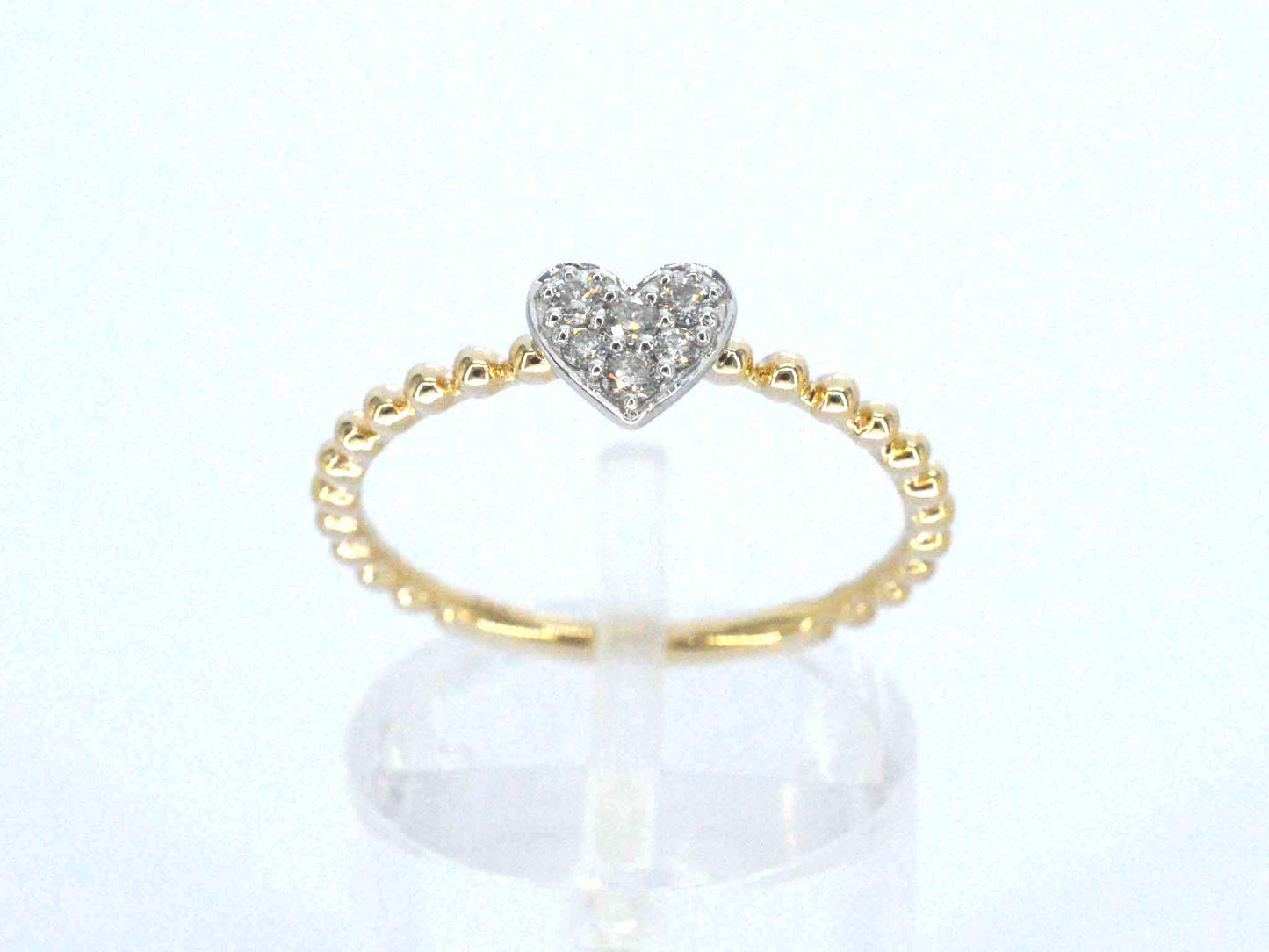 Gouden ring met een hartje vol gezet met diamanten