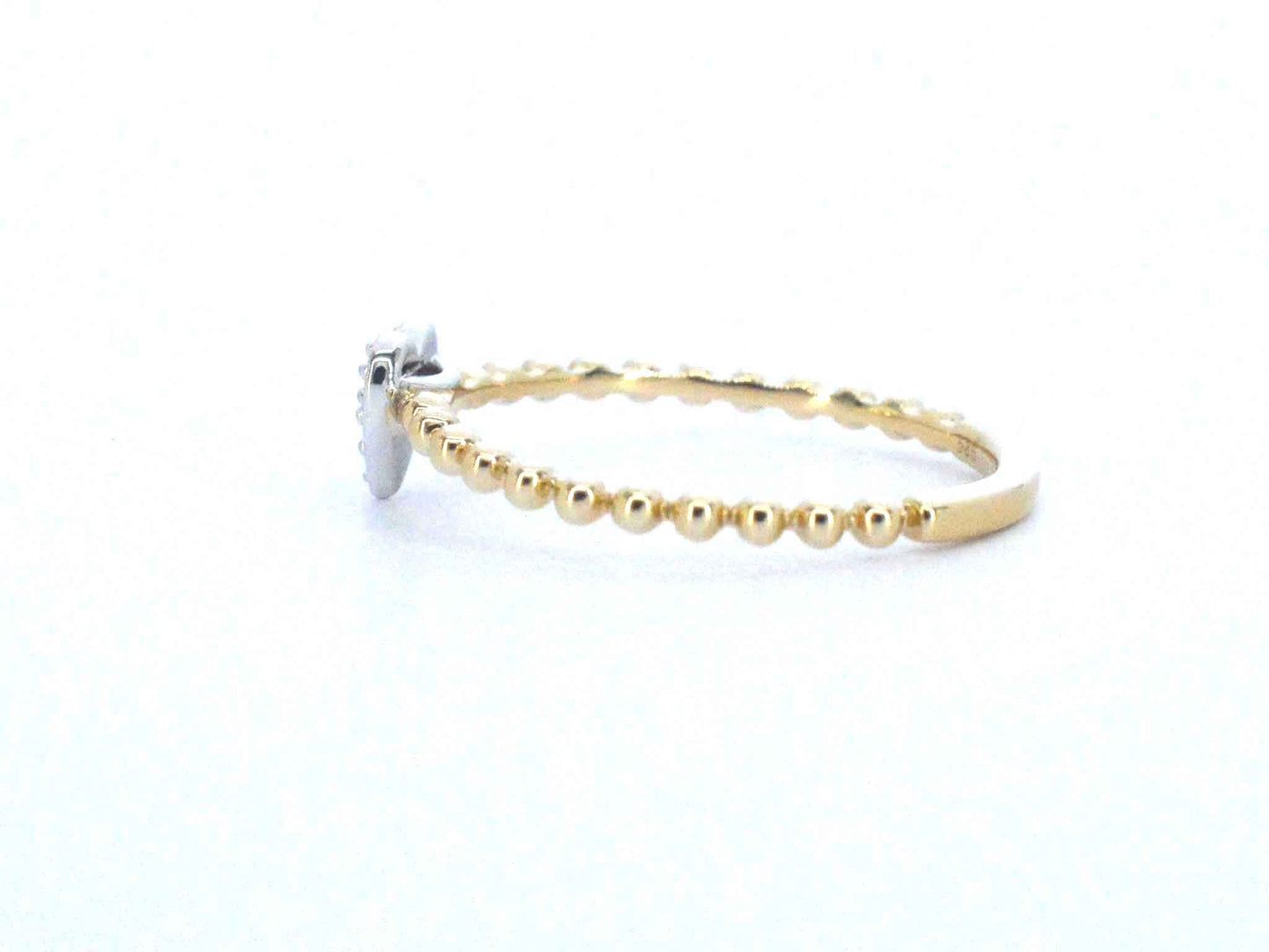 Gouden ring met een hartje vol gezet met diamanten