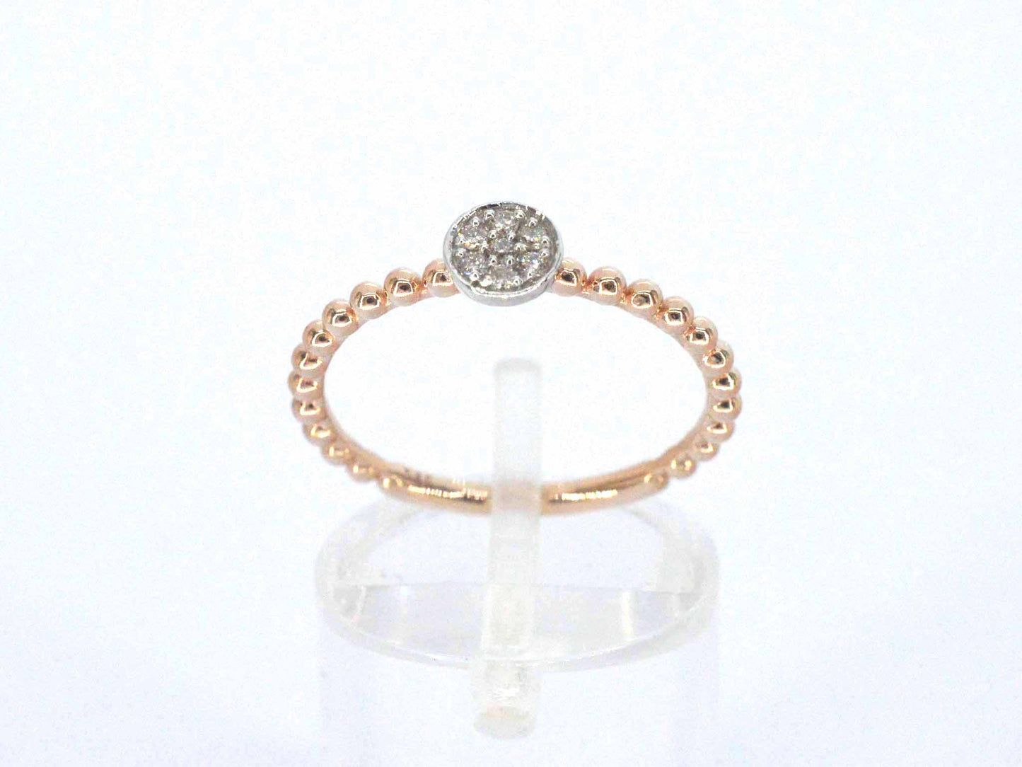Rosegouden ring met centraal een rondje vol gezet met diamanten