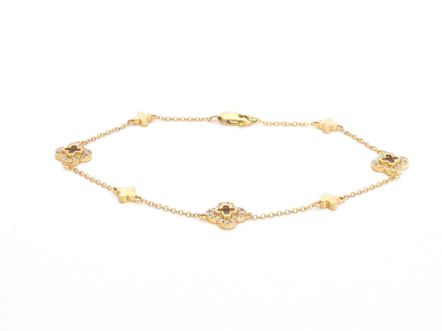 Gouden armband in klaver vier vorm met diamanten
