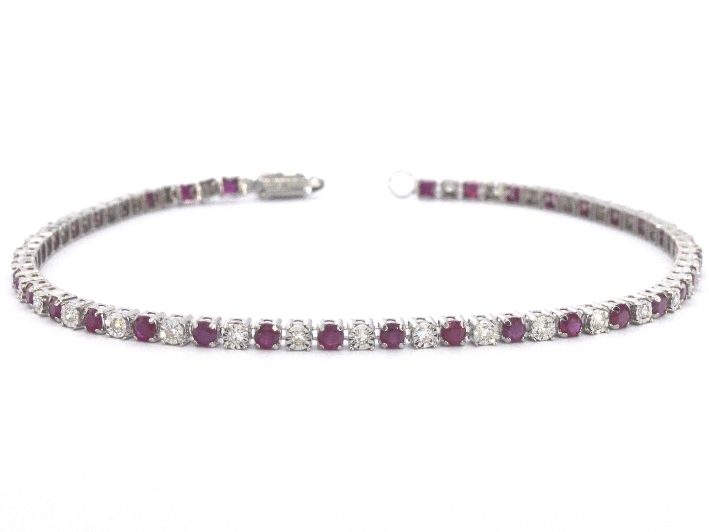 Witgouden tennisarmband met diamanten en robijnen