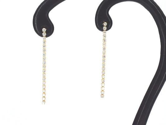 Gouden oorhangers met een rij aan natuurlijke diamanten