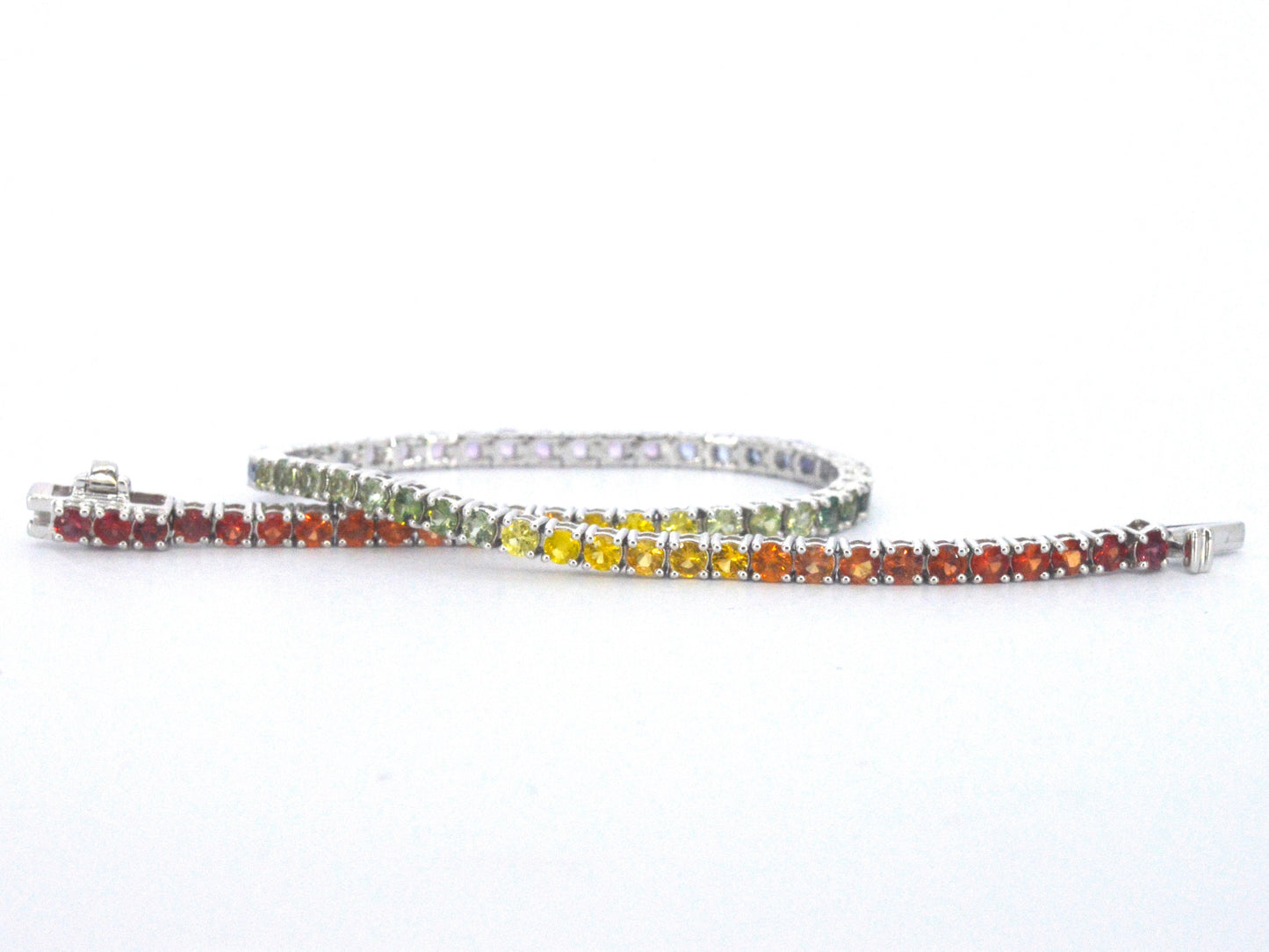 Gouden tennisarmband met multicolour saffieren