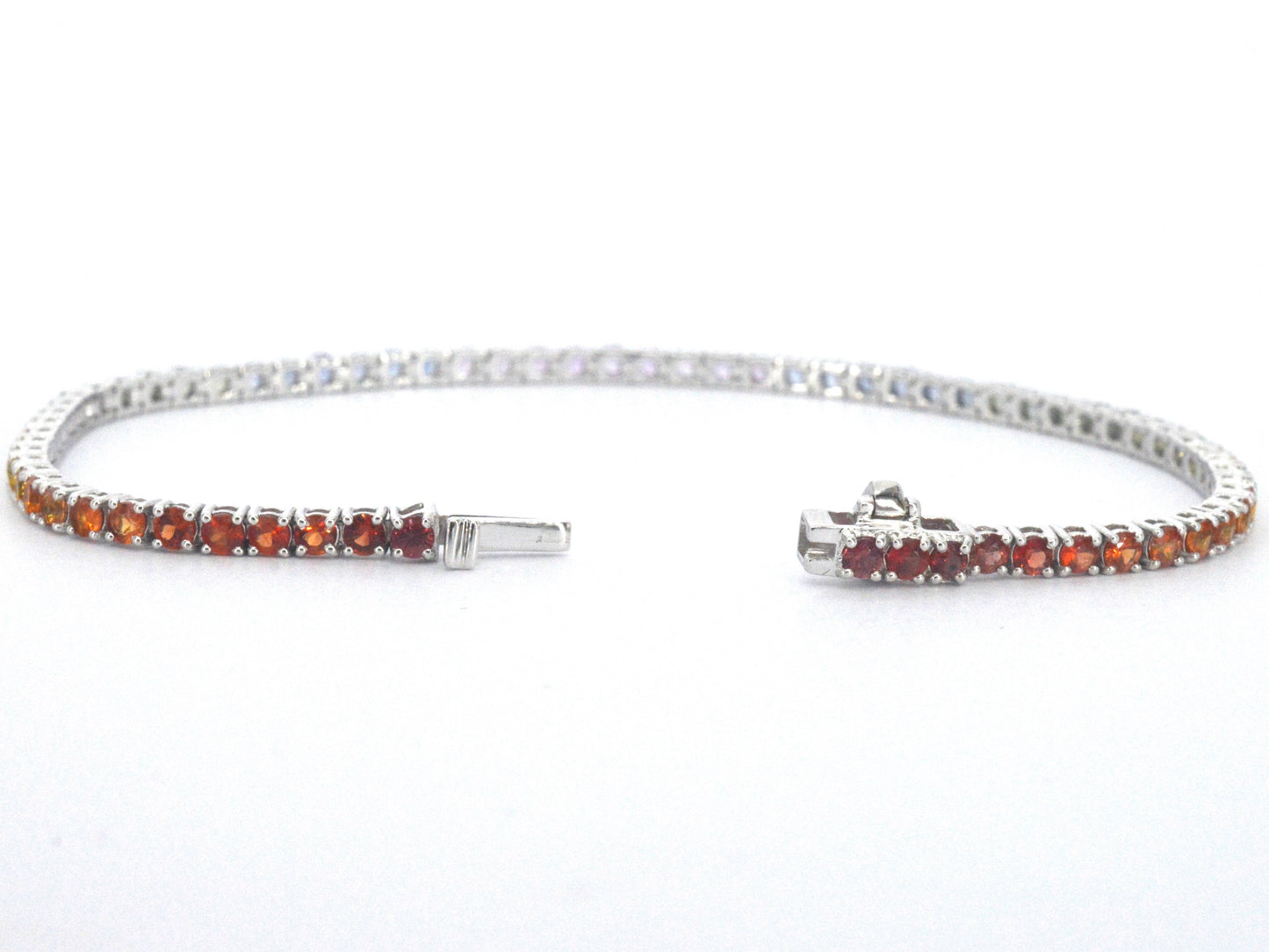 Gouden tennisarmband met multicolour saffieren