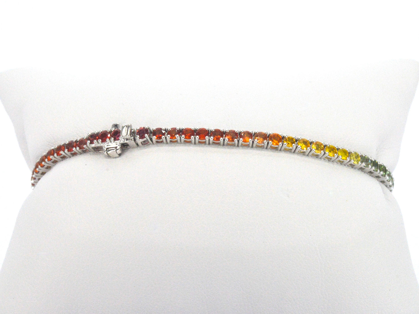 Gouden tennisarmband met multicolour saffieren